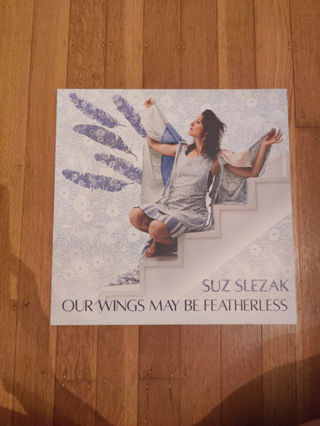 Suz Slezak – Our Wings May Be Featherless 🇺🇸