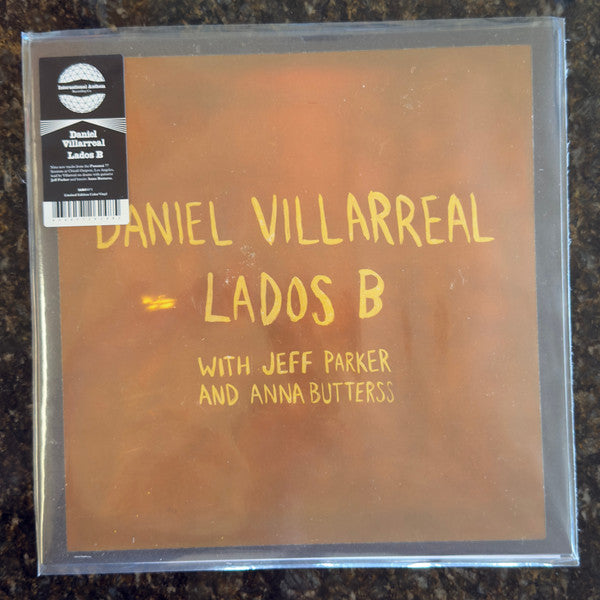 Daniel; Jeff Parker; Anna Butterss Villarreal – Lados B (Orange Vinyl/140G) 🇺🇸